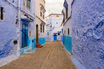 Fototapeta na wymiar It's Blue wall of Chefchaouen, small town in northwest Morocco famous by its blue buildings