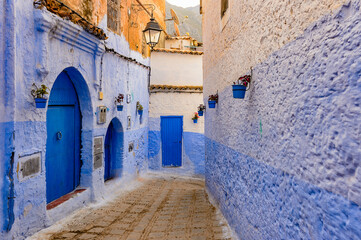 Fototapeta na wymiar It's Blue wall of Chefchaouen, small town in northwest Morocco famous by its blue buildings