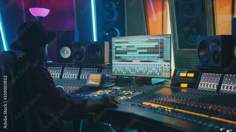 Aufkleber portrait of audio engineer working in music recording studio, uses mixing board create modern sound.