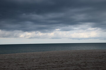 Obraz premium Rain clouds in the sea while a rain storm is coming.