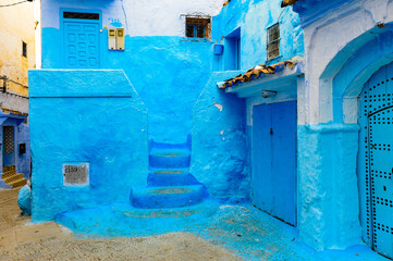 It's Blue painted walls of the houses in Chefchaouen, small town in northwest Morocco famous by its blue buildings