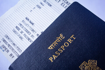 Valid travel document in flight boarding pass and passport. Republic of India passports.