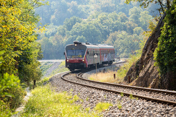 Naklejka premium Old-time Diesel train on railway tracks