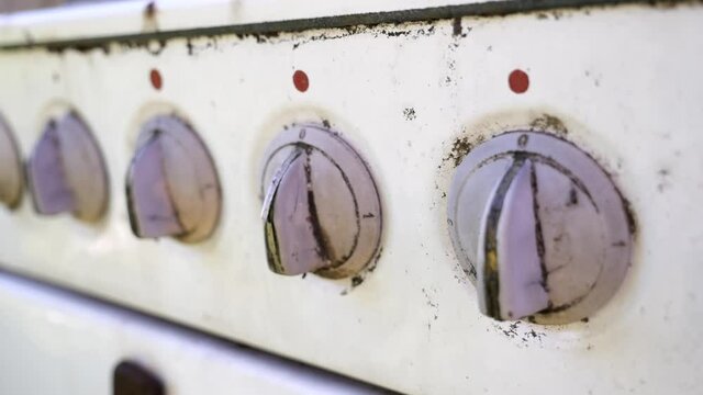 Kitchen stove buttons in a row close-up slow motion footage