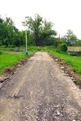 Walkway in the reconstruction phase for pedestrians and cyclists by the river and the railway bridge