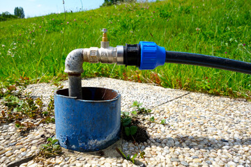 Water pipes led out of the ground to supply water to the pool and garden