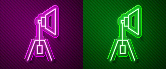 Glowing neon line Movie spotlight icon isolated on purple and green background. Light Effect. Scene, Studio, Show. Vector Illustration.