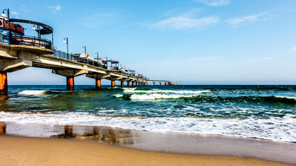 Pier and waves at sea in Miedzyzdroje