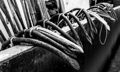 Anchors hung on the wall of the ship