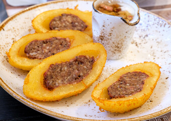 Cepelinai, dumplings made from grated and riced potatoes and stuffed with ground meat, is regarded as the national dish of Lithuania © Kapi