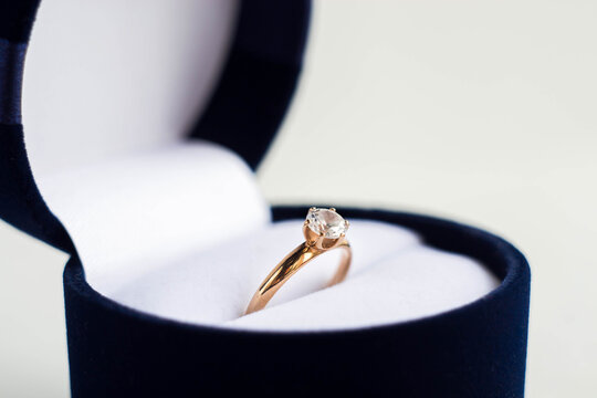 a ring with a precious stone for engagement, making an offer, showing love