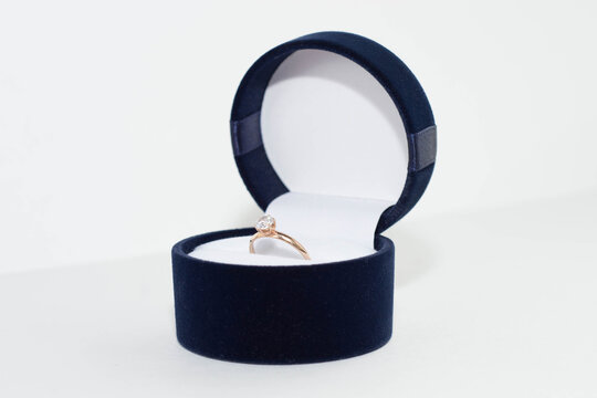 a ring with a precious stone for engagement, making an offer, showing love