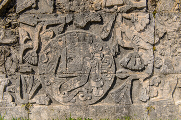 Carvings on a temple of Chichen Itza, Tinum Municipality, Yucatan State. It was a large pre-Columbian city built by the Maya people of the Terminal Classic period. UNESCO World Heritage