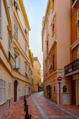 Fototapeta na wymiar It's Beautiful small touristic street in Monaco near the Prince's Palace of Monaco.