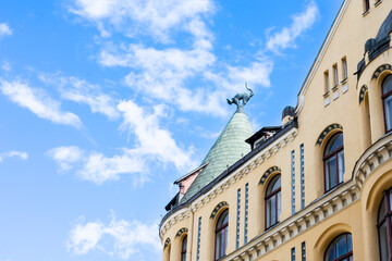 Riga, Latvia, September, 17, 2019: Roof and tower of Cat House with cat statues on top of it. Latvian famous buildings in art nouveau style.