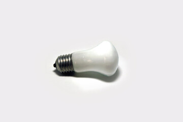 incandescent bulb on  a white backgound. incandescent lamp, incandescent light globe. energy concept.