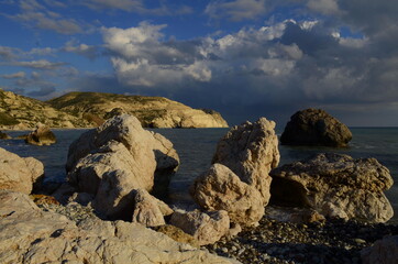 Fototapeta na wymiar Paphos. Cyprus. Petra Tou Romiu. Sunset at the rocks of Aphrodite
