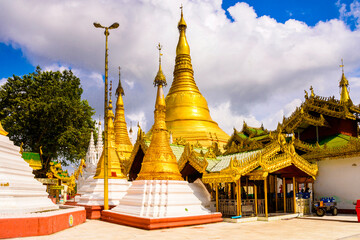Naklejka premium It's Surroundings of the Shwedagon Pagoda, a gilded stupa on the Singuttara Hill, Kandawgyi Lake, Yangon, Myanmar