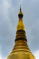 Fototapeta premium It's Surroundings of the Shwedagon Pagoda, a gilded stupa on the Singuttara Hill, Kandawgyi Lake, Yangon, Myanmar