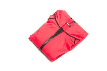 Folded red zipper windbreaker jacket, UV sun proof outdoor jacket hoodie. Track jacket sport hoodie full zip isolated on white background. Folded clothes.