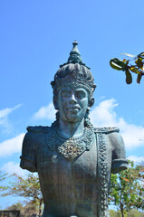 Wishnu hindu god statue in GWK culture park in Bali, Indonesia. Garuda Wisnu Kencana Cultural Park in popular touristi attraction since 2011.