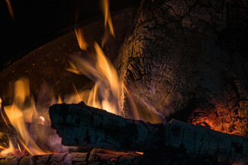 Burning coals from a fire abstract background