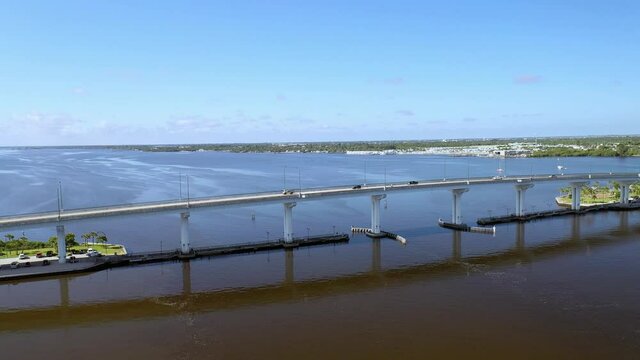 Indian River Waterway in St Lucie Florida. Morning traffic on a bridge going to Jensen Beach