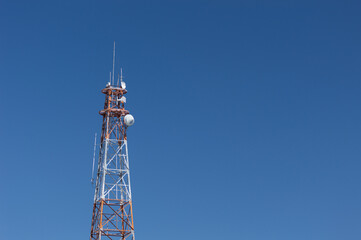 Antenna isolated against blue sky