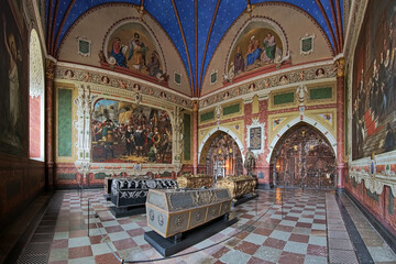 Obraz premium Panorama of interior of Christian IV's chapel in Roskilde Cathedral, Denmark, with sarcophagi of king Christian IV of Denmark and members of his family including his son king Frederick III of Denmark.