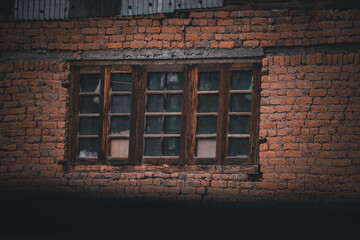 old brick wall with window