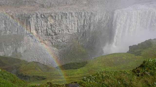 Detifoss waterfall with rainbow, Iceland