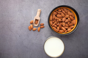  almond nut and milk on table top down