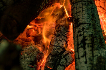 Burning coals from a fire abstract background