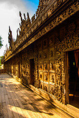 Fototapeta na wymiar It's Shwenandaw Monastery (Golden Palace Monastery), a historic Buddhist monastery located in Mandalay Region, Myanmar