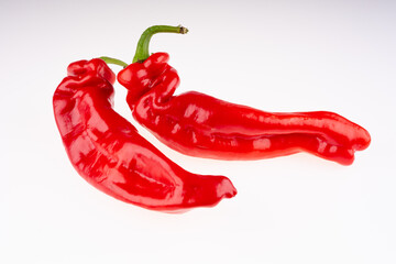 two bio red pointed peppers, not perfect