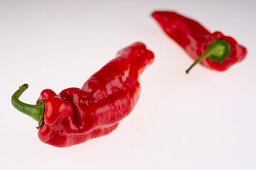 two bio red pointed peppers, not perfect