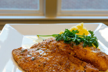 Parmesan Crusted Tilapia with Potatoes with a Beurre Blanc 