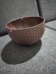 Plastic plant bowl on the sofa