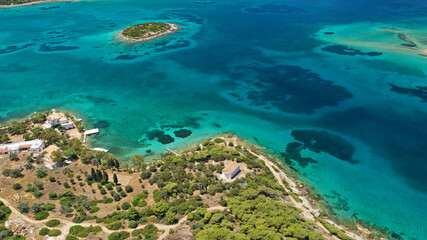 Fototapeta na wymiar Aerial drone photo of beautiful paradise island complex in gulf of of Petalioi or Petalion that form a blue lagoon with sandy turquoise beaches, South Evoia island near Marmari, Greece