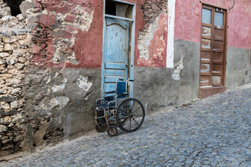 Wheelchair in front of a house in Ponta de Sol, Island of Santo Antao, Cape 