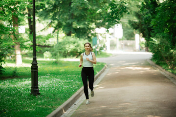 healthy lifestyle, girl playing sports,. She is in sportswear