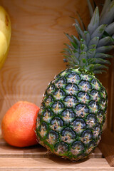 composition of exotic tropical fruit in a wooden box