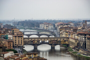 Fototapeta na wymiar Ponte Vecchio the famous Arch bridge in Florence on Arno river, Tuscany, Italy