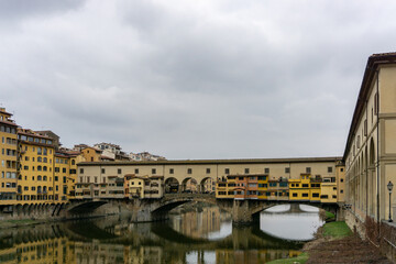 Ponte Vecchio the famous Arch bridge in Florence on Arno river, Tuscany, Italy
