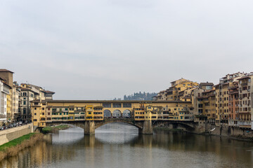 Ponte Vecchio the famous Arch bridge in Florence on Arno river, Tuscany, Italy © marcodotto