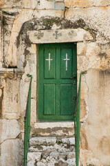 Fototapeta premium Old buildings in a Coptic part of the complex of the Basilica of the Holy Sepulchre in Jerusalem