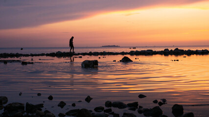 sunset on the beach and man