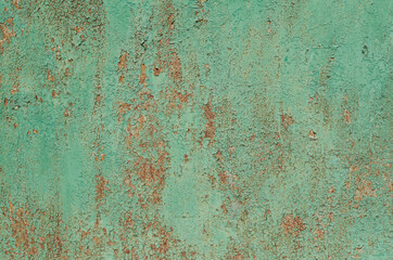 Old, cracked paint. Iron surface. Rust.