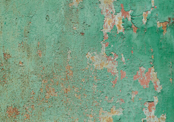 Old, cracked paint. Iron surface. Rust.
