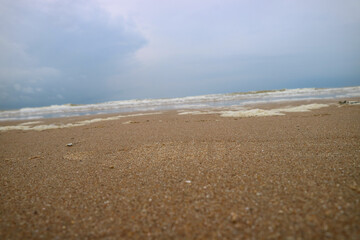 Fototapeta na wymiar sand beach with waves